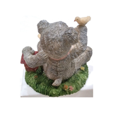 BUNNY SUIT FIGURINE - BABY WITH BIRDS