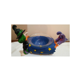 LYING DOWN WITCH WITH DISH