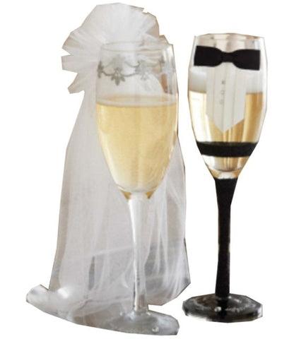 CHAMPAGNE GLASSES WITH ADORNMENTS